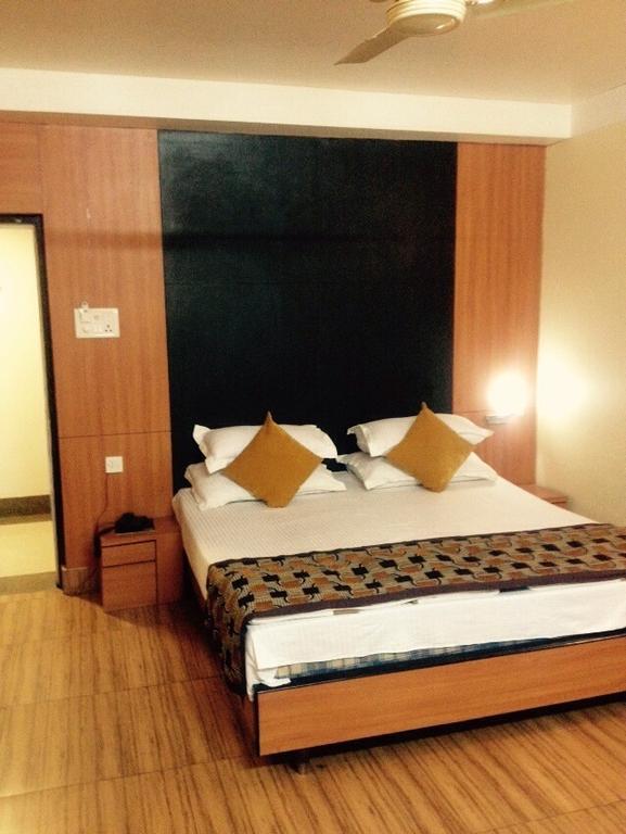 Hotel Bengal International Силигури Номер фото