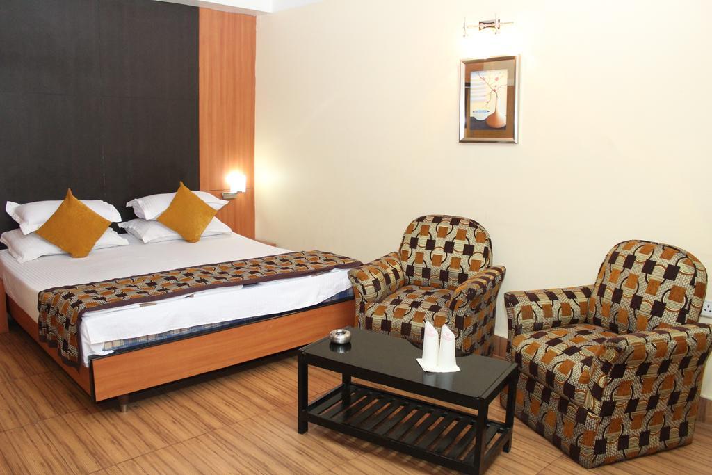 Hotel Bengal International Силигури Номер фото